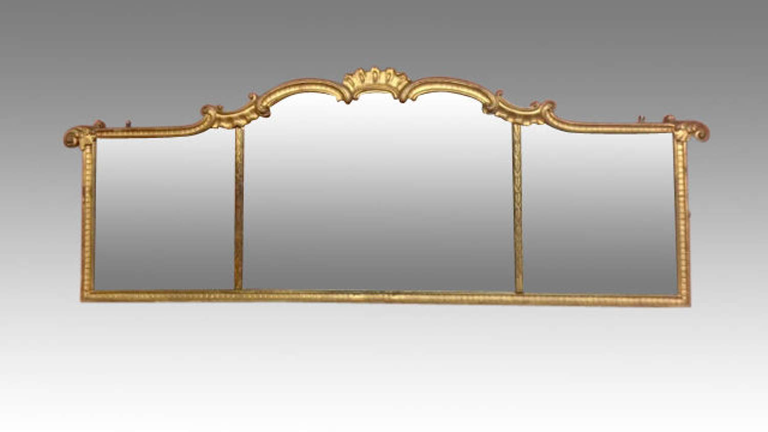 18th century antique carved giltwood landscape mirror.