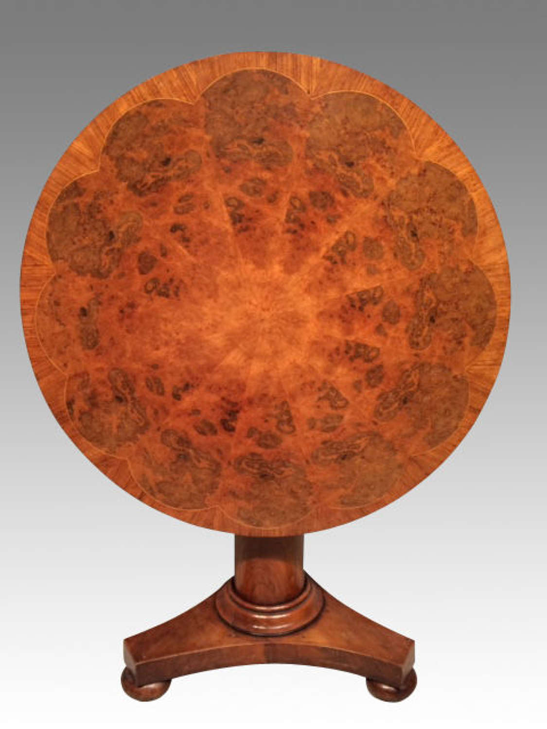 A 19th century antique circular mahogany centre table.