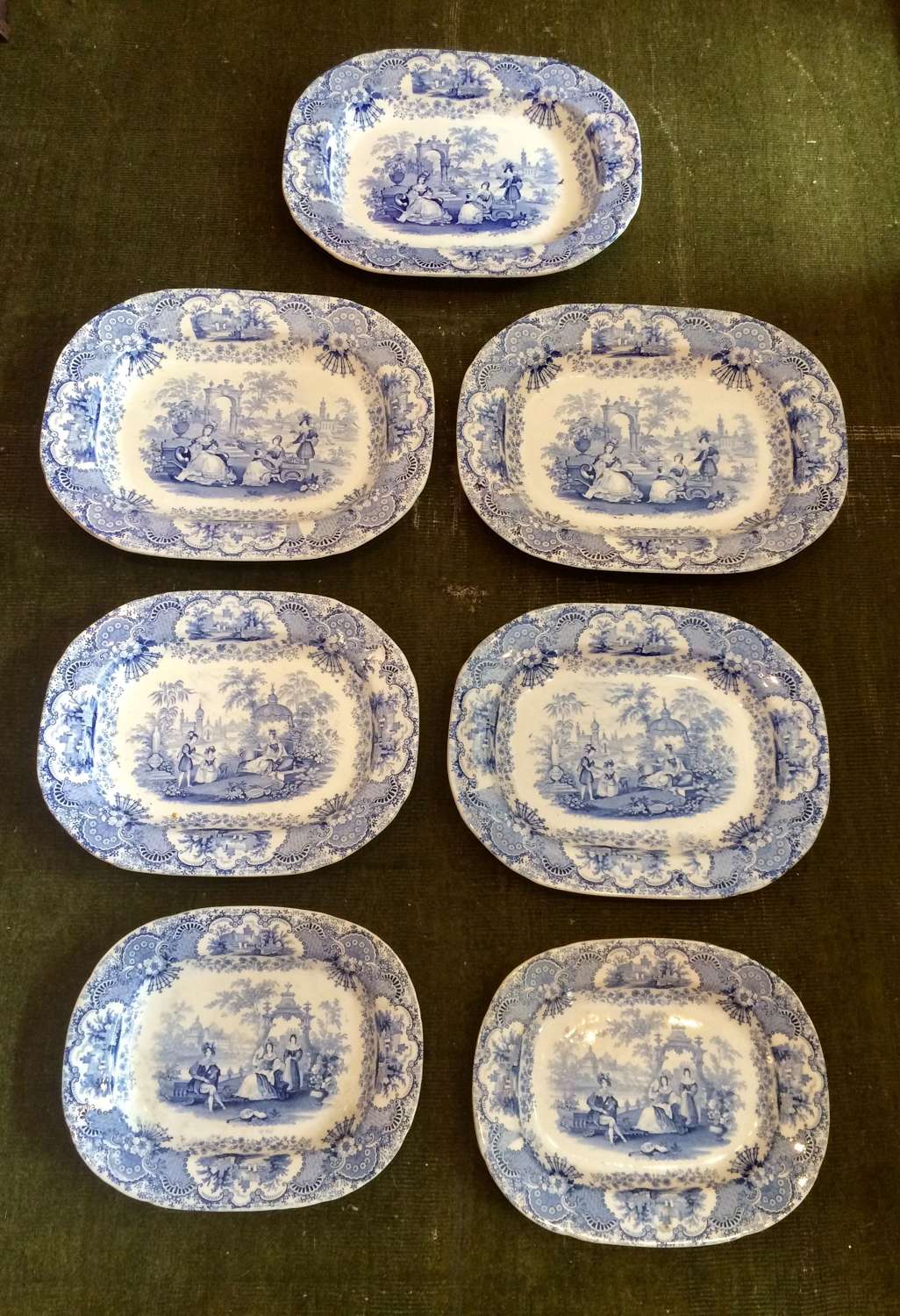 Set of 7 19th century blue and white transferware platters.