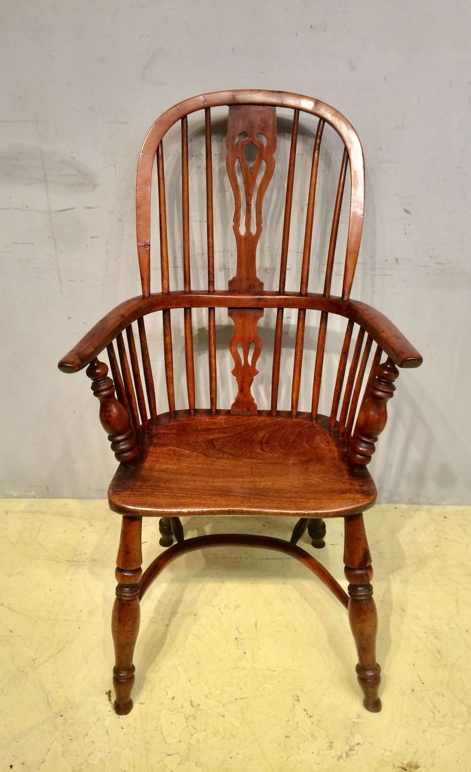19th century tall back yew wood windsor armchair.