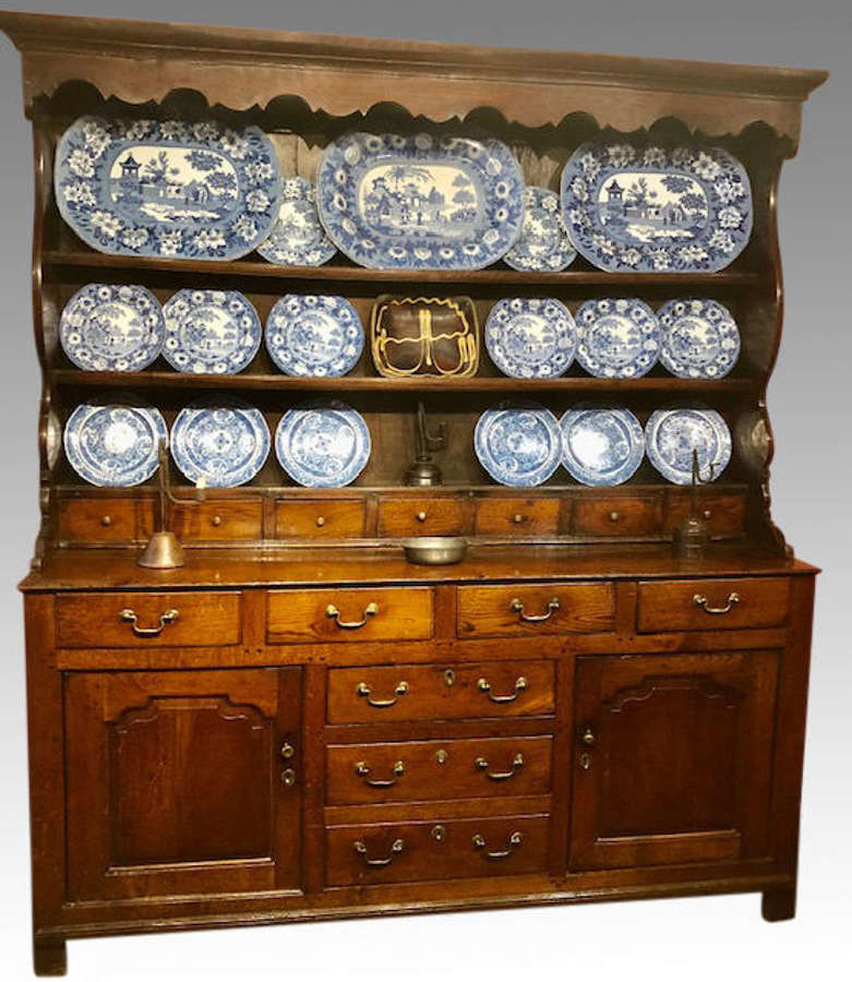 18th century oak Welsh dresser and shelves.