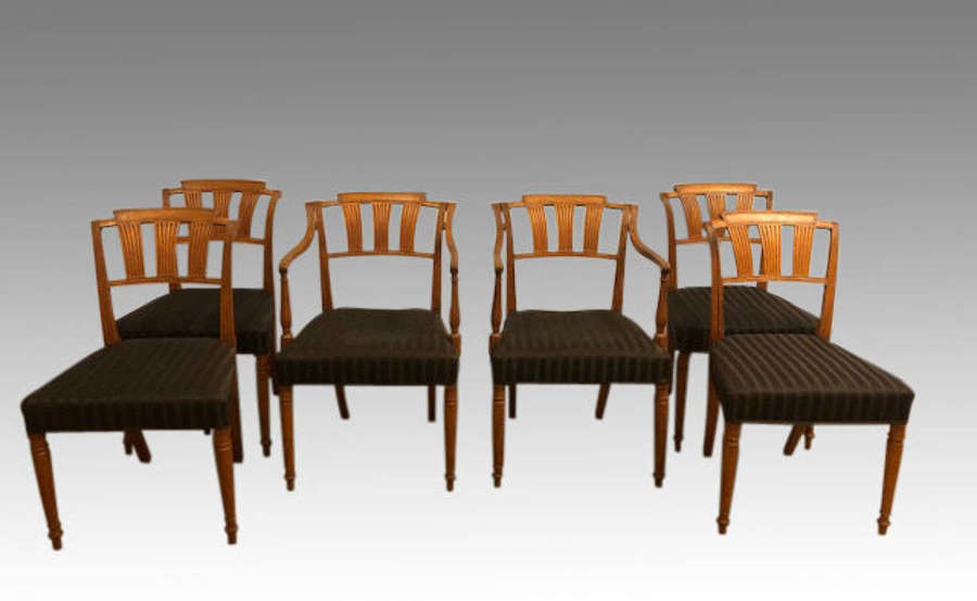 A set of six Georgian mahogany dining chairs.