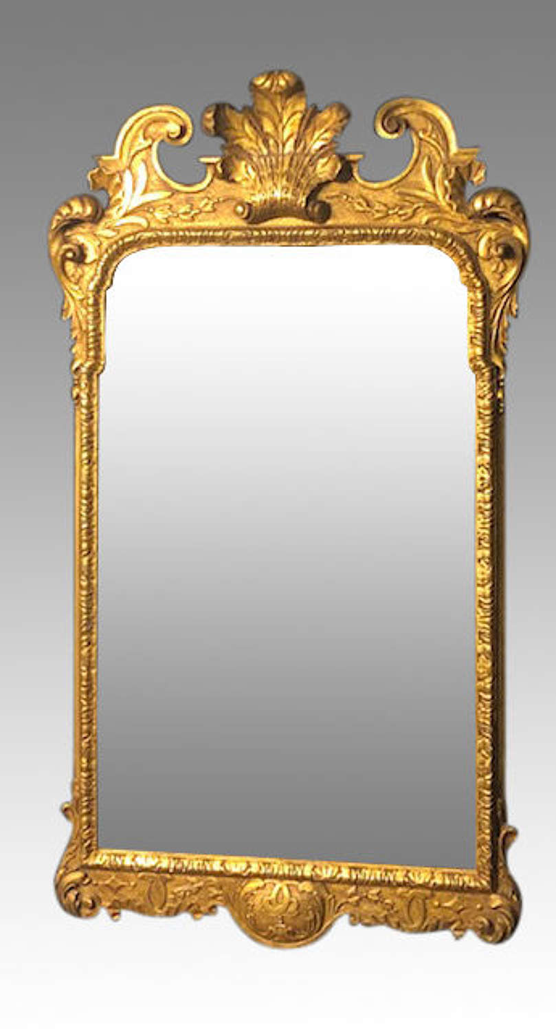 Geo II style carved giltwood mirror.