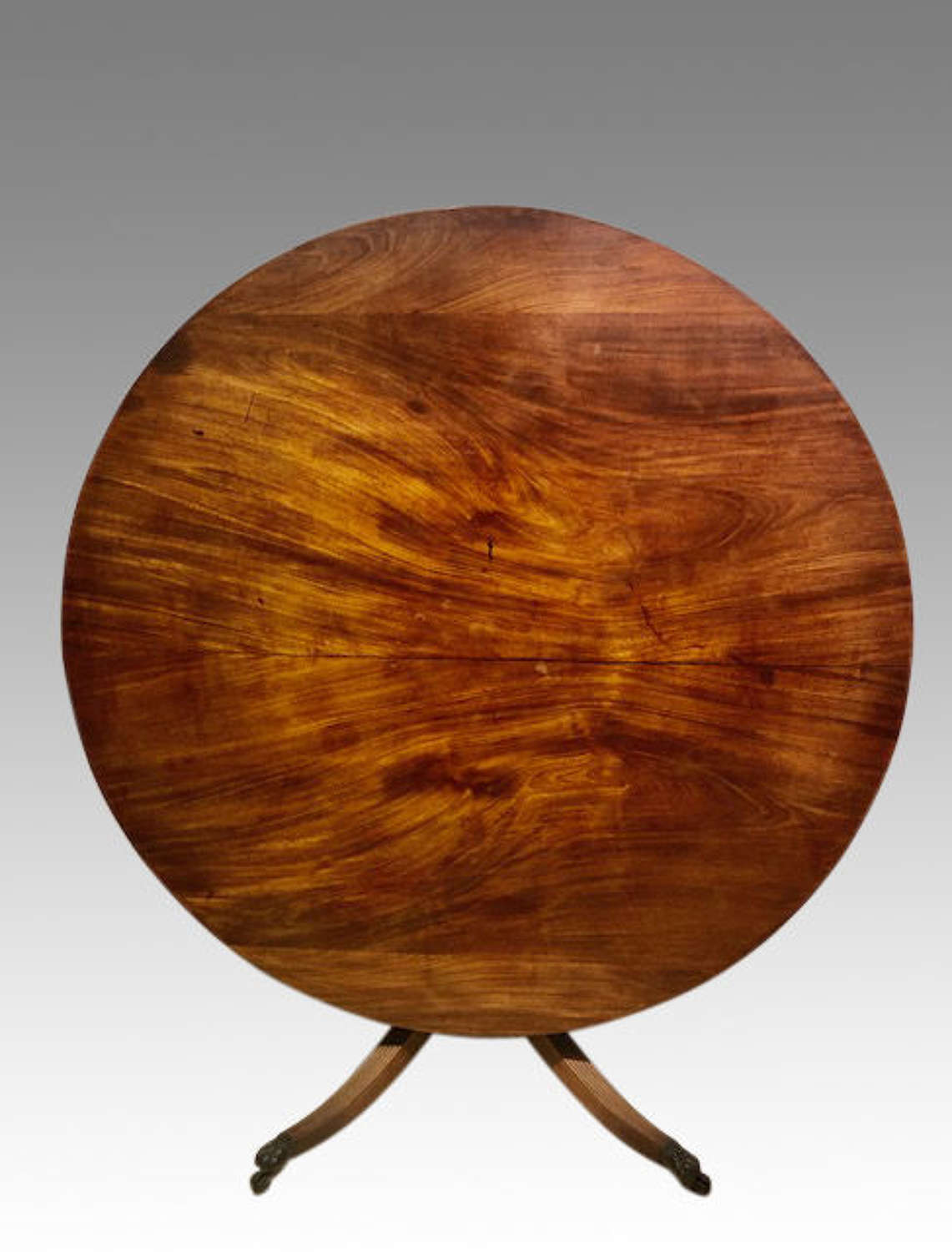 Georgian circular mahogany pedestal dining table.