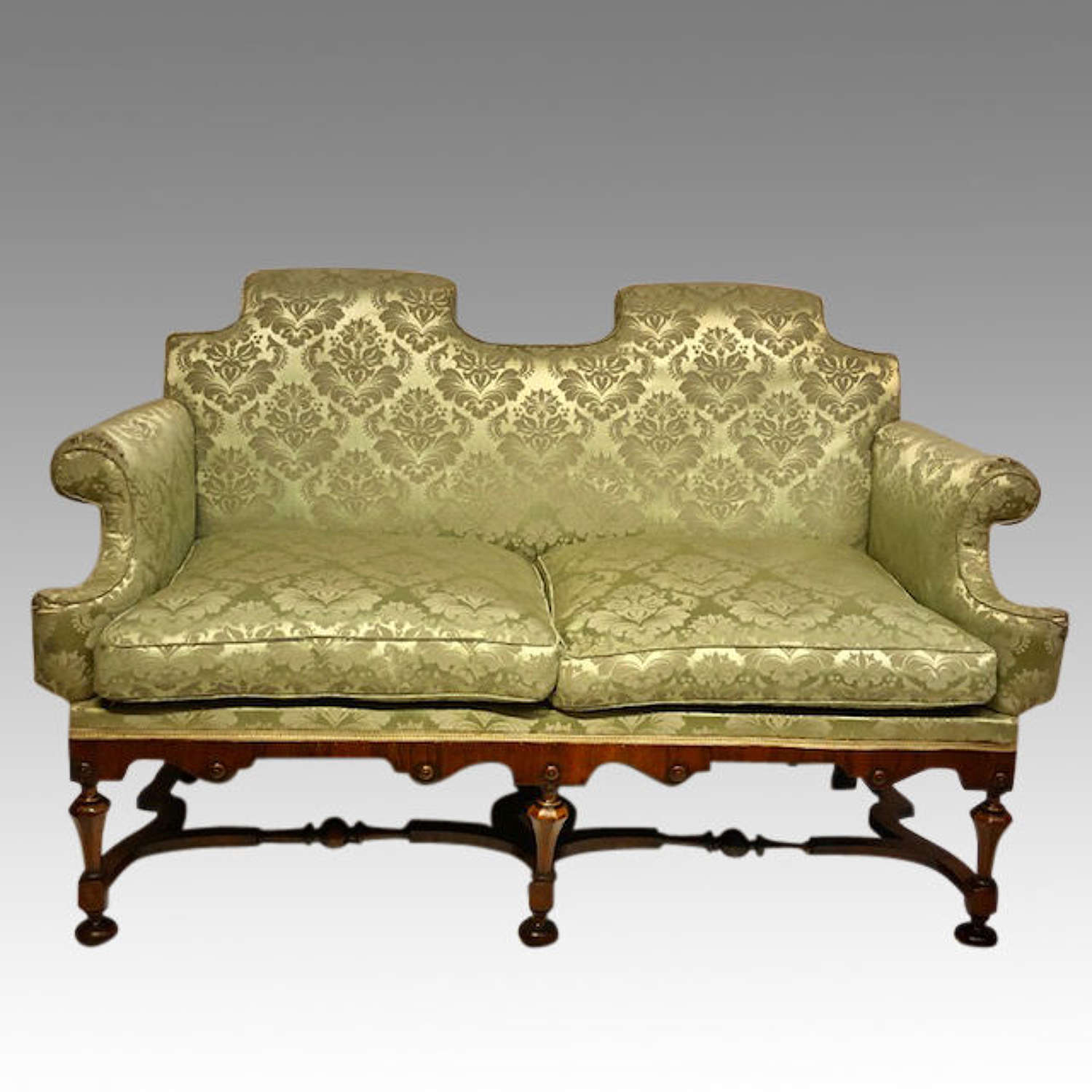Small William and Mary style walnut settee.