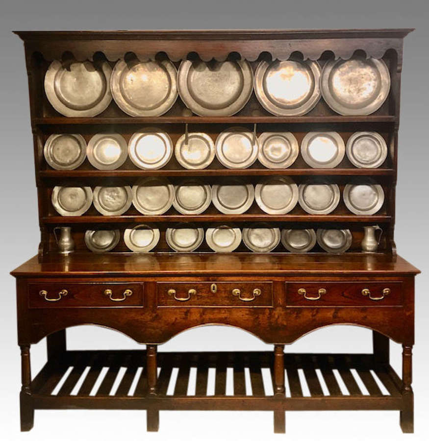 18th century Welsh oak dresser and shelves.