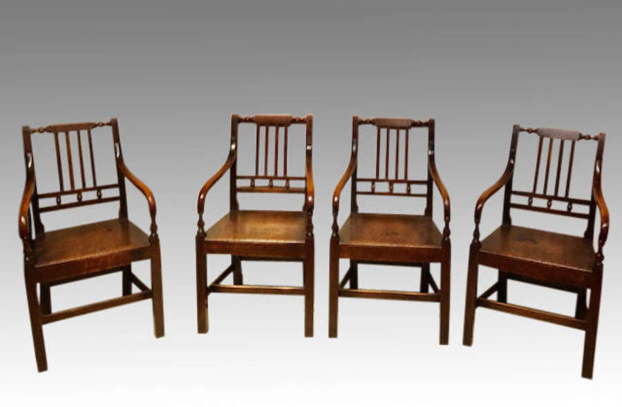 Set of four Georgian mahogany armchairs.