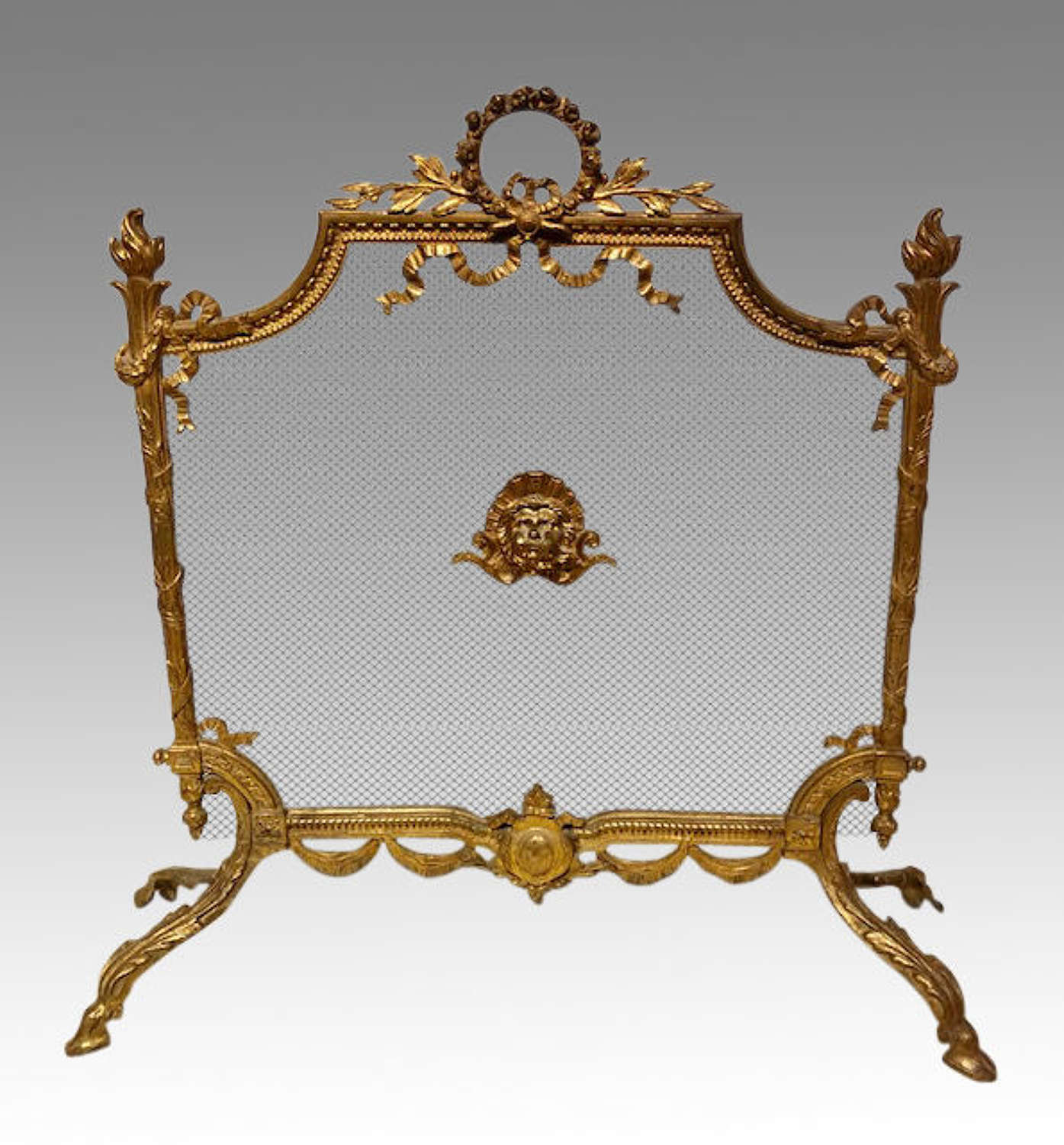 Antique French ormolu fireguard in the Rococo style.