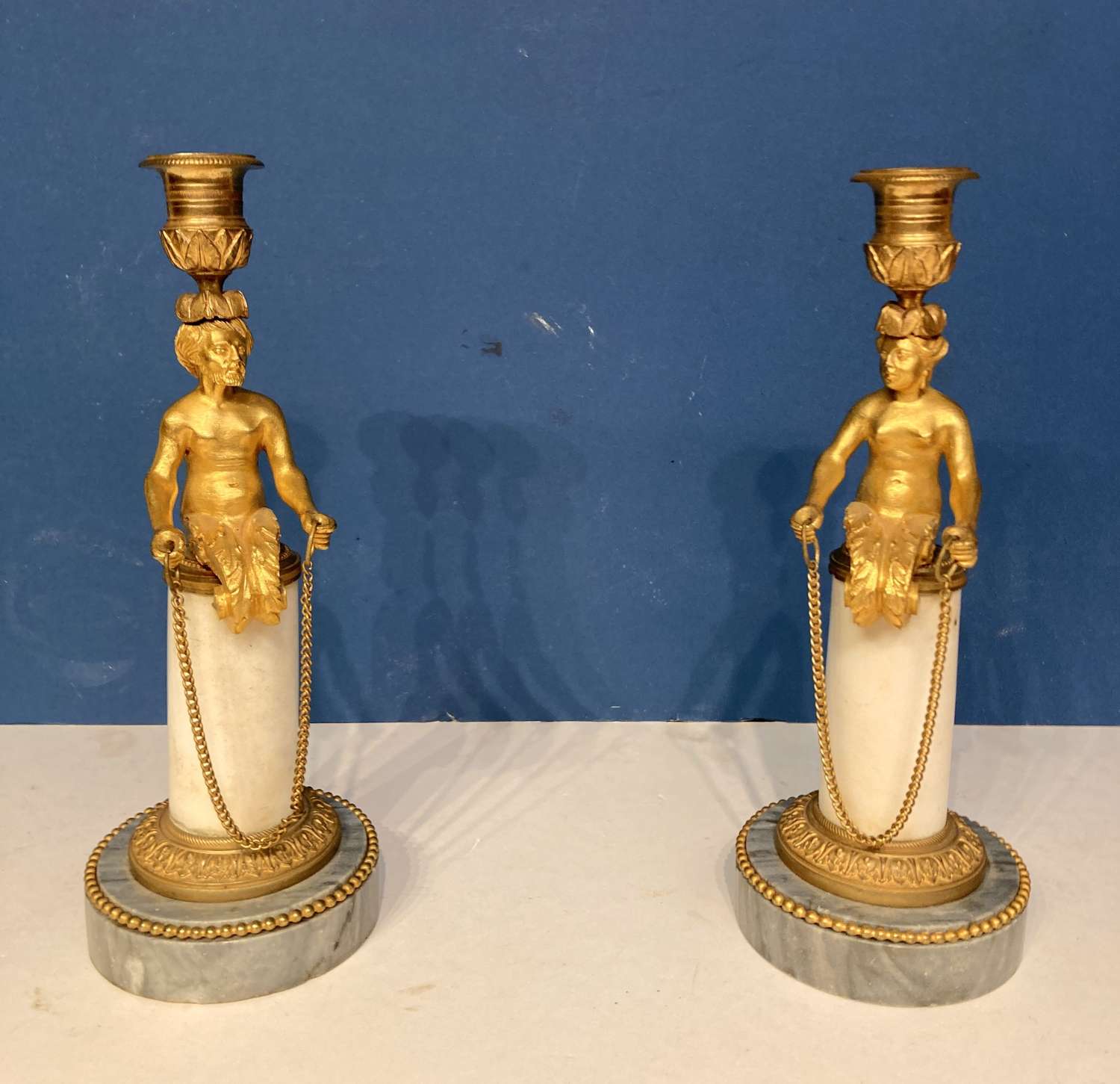 Pair of 19th century French ormolu and marble candlesticks.