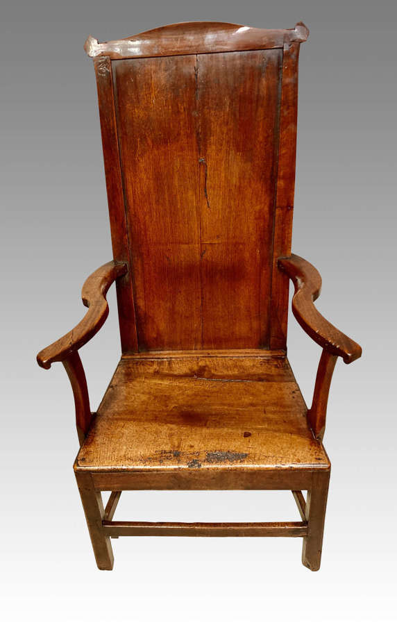 Antique Welsh tall back country armchair.