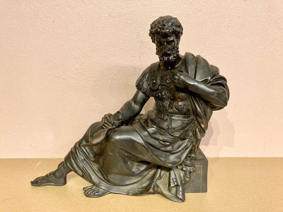 Antique NeoClassical seated bronze figure.
