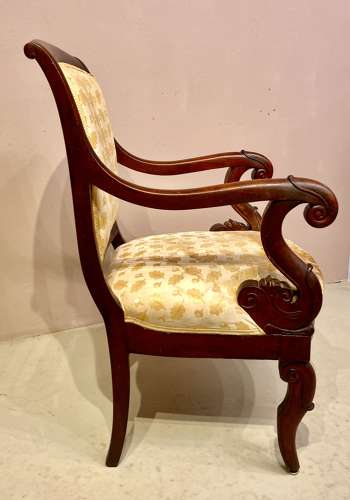 Antique French mahogany armchair.