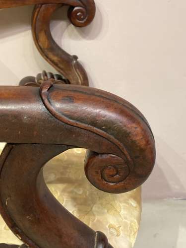 Antique French mahogany armchair.