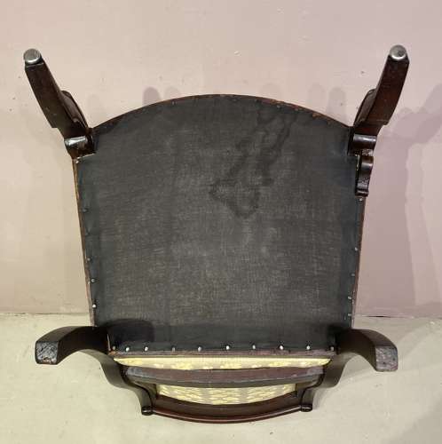 Antique French mahogany armchair.