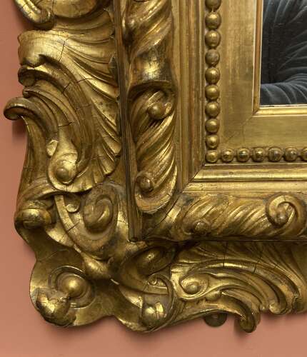Early 19th century carved giltwood mirror.