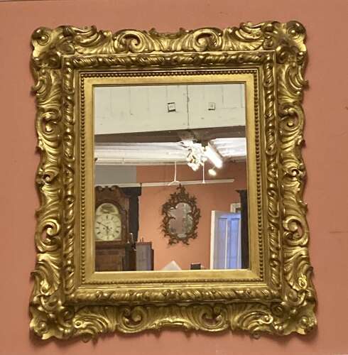 Early 19th century carved giltwood mirror.
