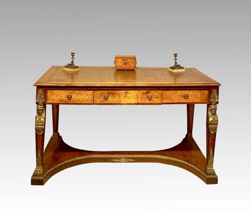 French mahogany and bird’s eye maple writing table.