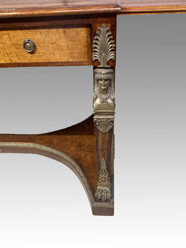 French mahogany and bird’s eye maple writing table.