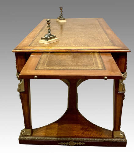 French mahogany and bird’s eye maple writing table.