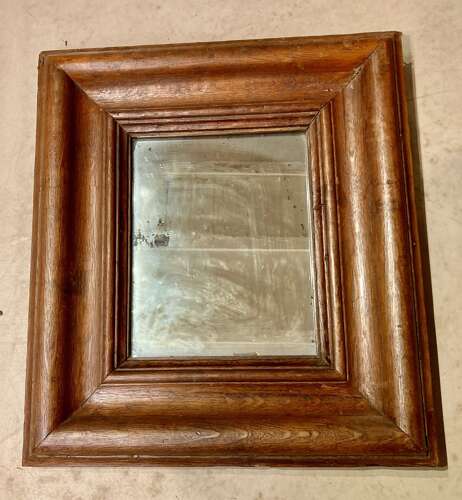 Early oak cushion mirror.