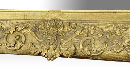 Carved giltwood and gesso wall mirror.