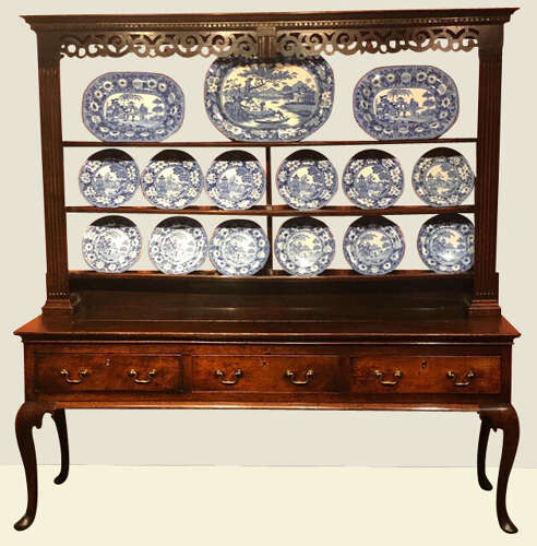 Geo II Welsh oak cabriole leg dresser and shelves.