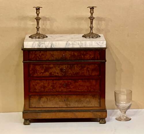 Miniature French mahogany chest of drawers .