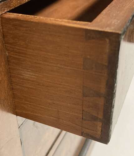 Miniature French mahogany chest of drawers .