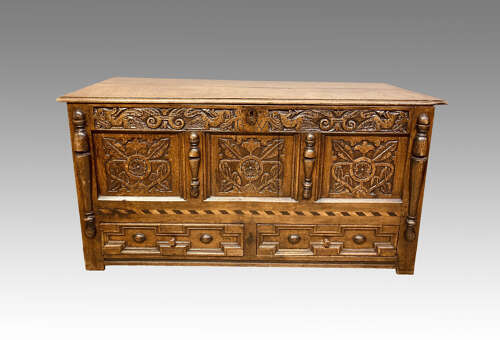 Charles II carved oak mule chest.