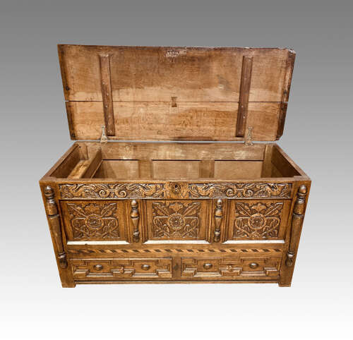 Charles II carved oak mule chest.