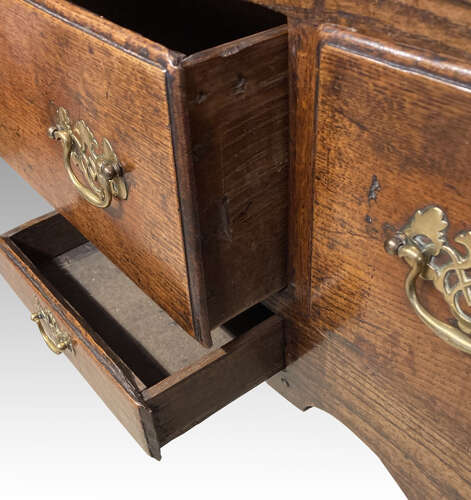 Georgian oak cabriole leg dresser base.