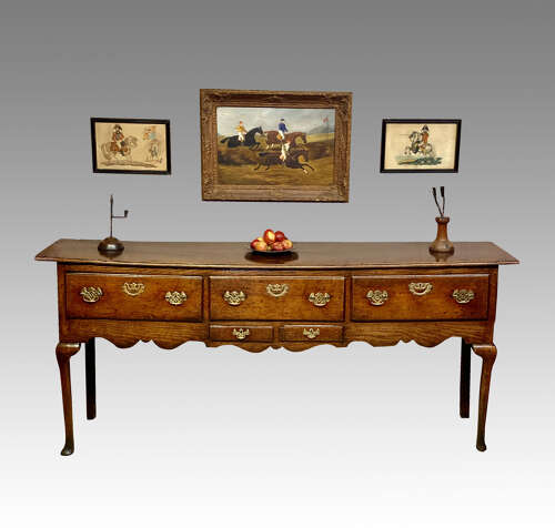 Georgian oak cabriole leg dresser base.