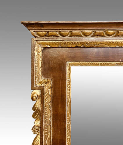 Large 19th century mahogany and carved giltwood wall mirror.