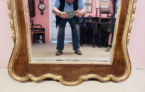 Large 19th century mahogany and carved giltwood wall mirror.
