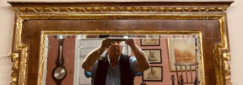 Large 19th century mahogany and carved giltwood wall mirror.