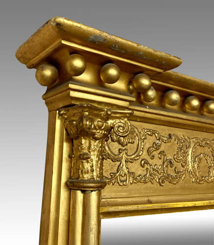 Regency carved giltwood pier mirror.