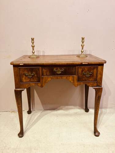 Geo I walnut lowboy .