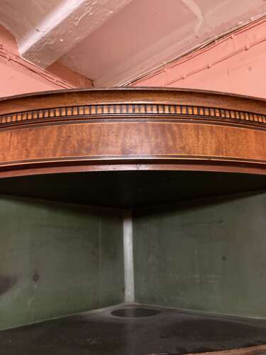 Georgian mahogany bow fronted hanging corner cupboard.