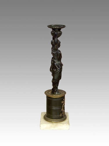 Pair of Regency bronze candlesticks.