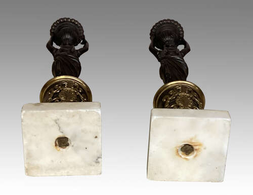 Pair of Regency bronze candlesticks.