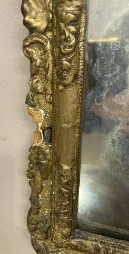 Queen Anne carved giltwood and gesso mirror.