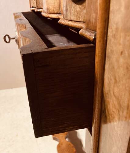Small Antique burr walnut cabinet on stand.