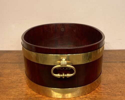 Geo III oval mahogany brass bound planter.