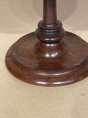 Late Georgian lignum and mahogany revolving egg cruet.