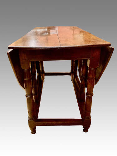Queen Anne oak gateleg dining table.