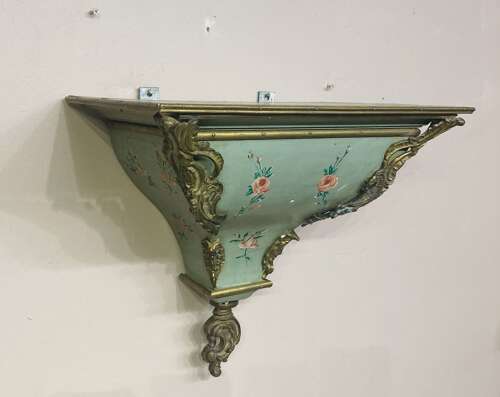 Antique painted hanging wall bracket.