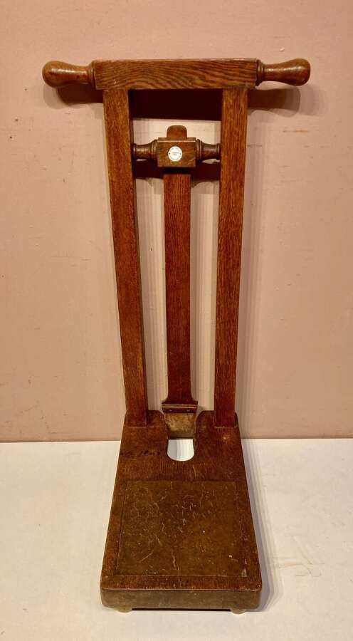 Antique Tom Hill oak boot jack.