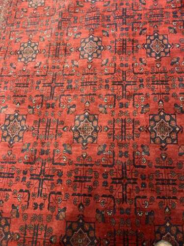 Iranian red ground rug.
