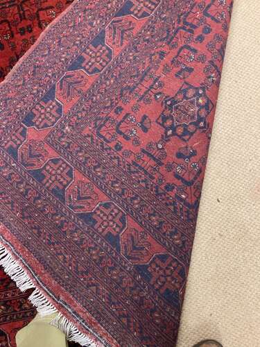 Iranian red ground rug.