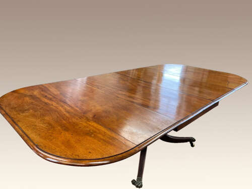Georgian mahogany extending dining table.